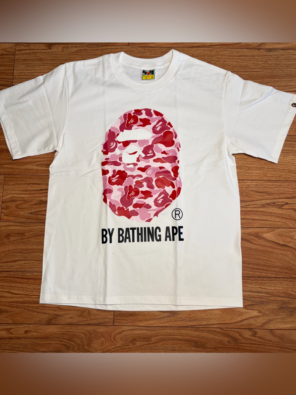 BAPE White T-Shirt with Pink Camo Ape Logo